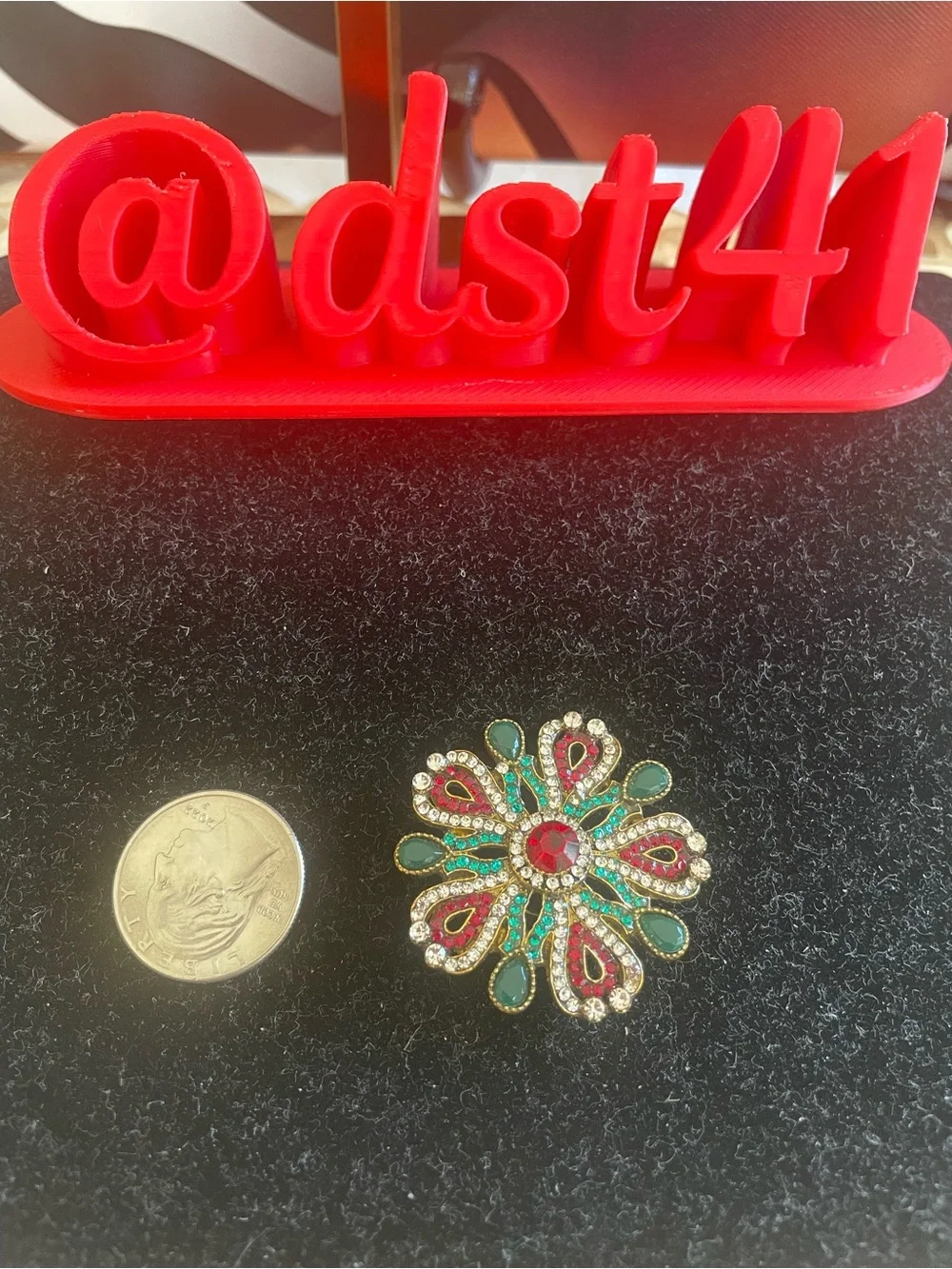 Gold-Tone Floral Brooch with Red and Green Stones
